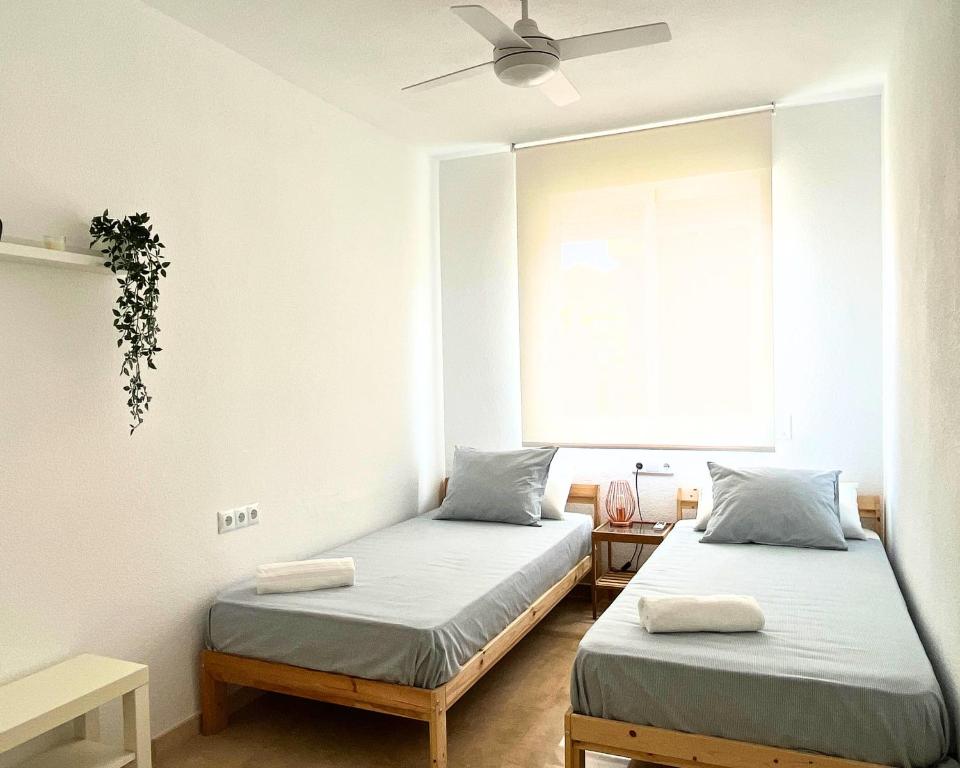 Postel nebo postele na pokoji v ubytování Apartamento dúplex 6 personas en zona tranquila CALPE