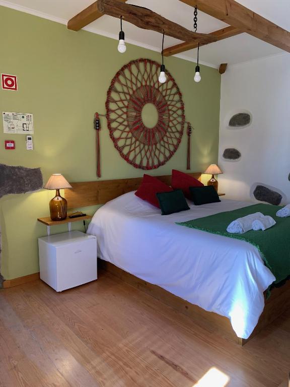 Postel nebo postele na pokoji v ubytování Casa do Plátano