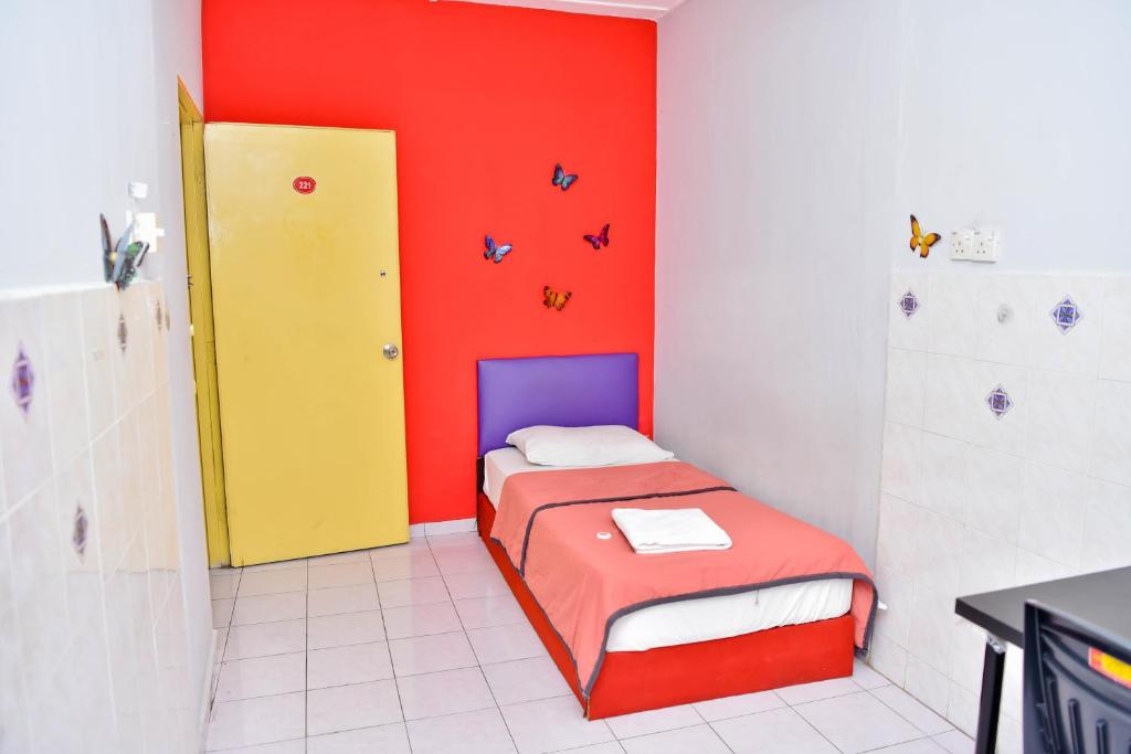 Postel nebo postele na pokoji v ubytování T FAMILY HOTEL