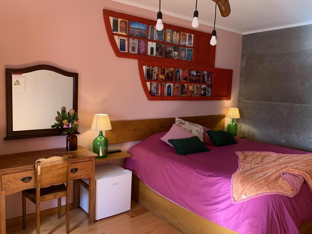 Postel nebo postele na pokoji v ubytování Casa do Plátano