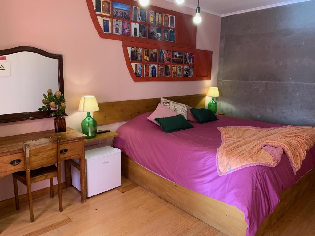 Postel nebo postele na pokoji v ubytování Casa do Plátano