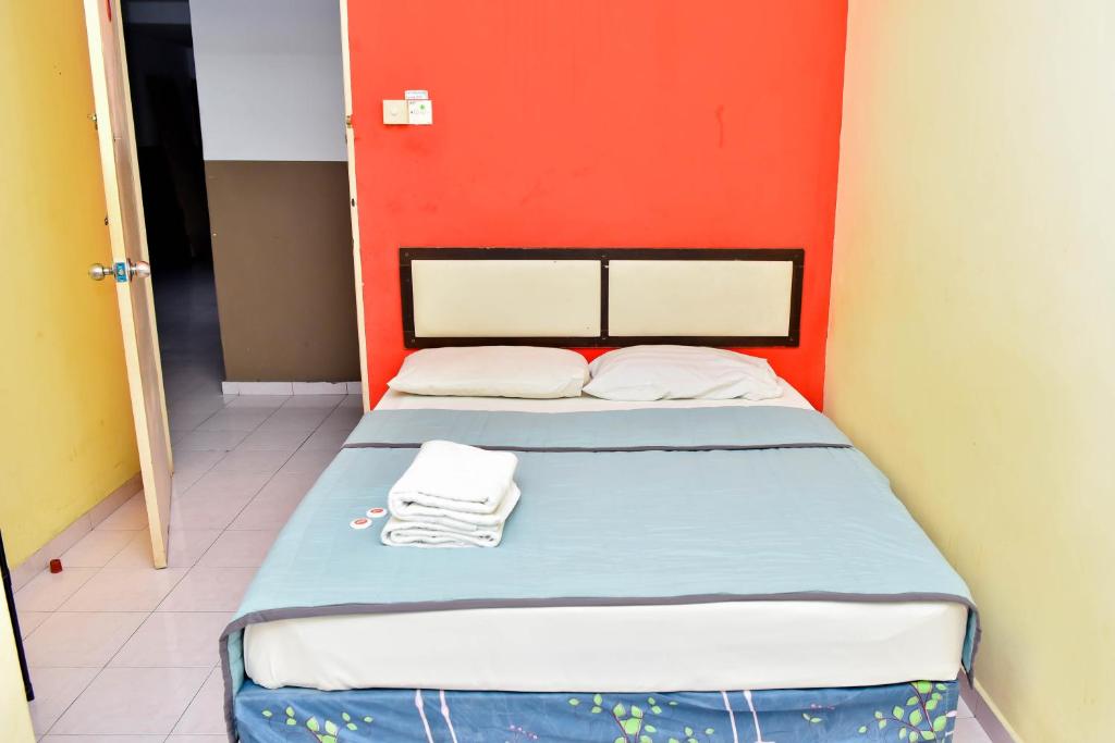 Postel nebo postele na pokoji v ubytování T FAMILY HOTEL