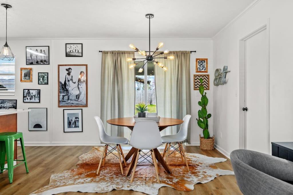a dining room with a table and chairs at Stylish 3BR 2BA House Minutes from PCB - Book now in Panama City