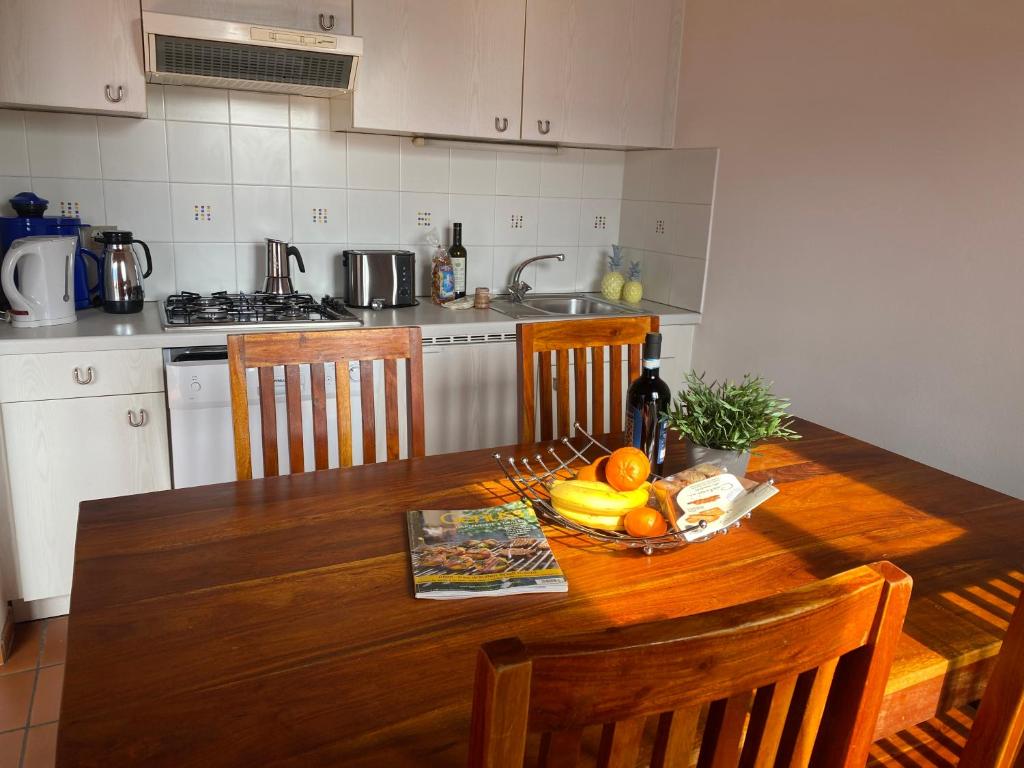 Kuchyň nebo kuchyňský kout v ubytování Casa Paola