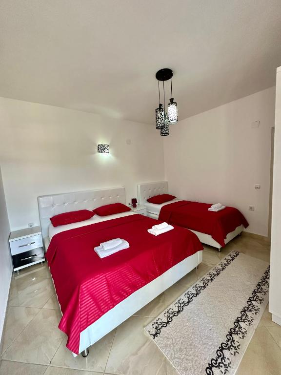 Postel nebo postele na pokoji v ubytování Queen Kodre Apartments