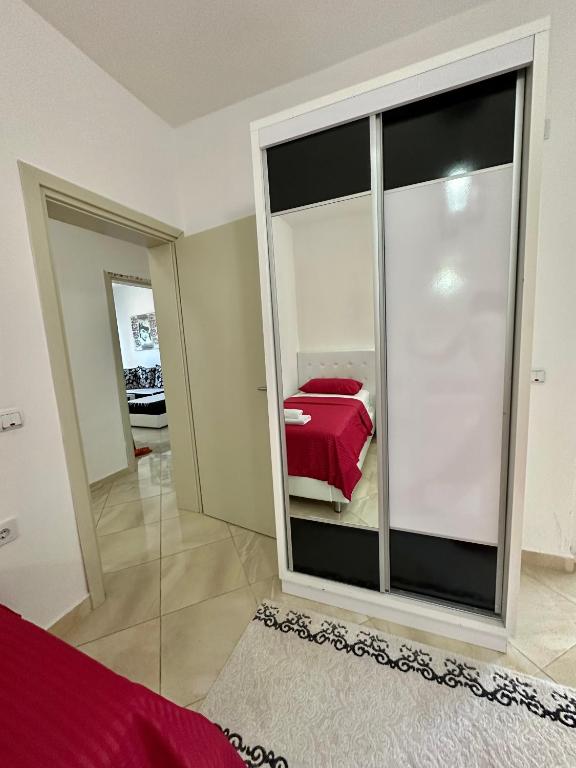 Postel nebo postele na pokoji v ubytování Queen Kodre Apartments