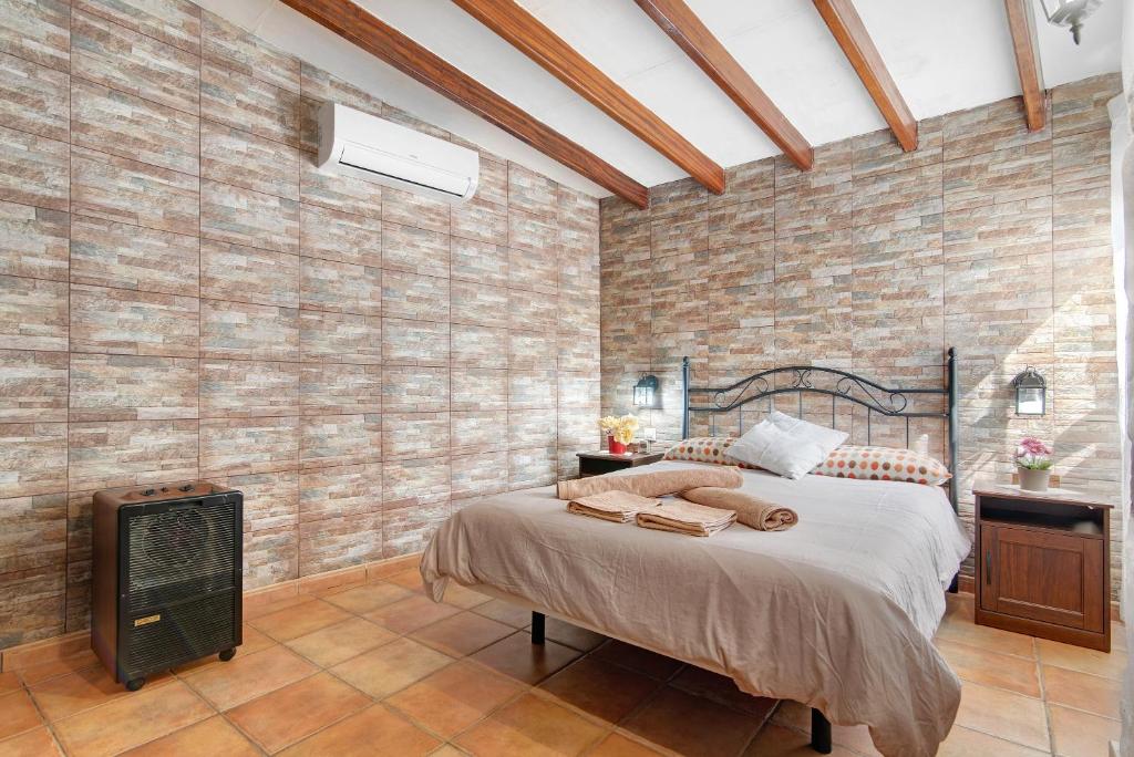 Postel nebo postele na pokoji v ubytování Casa Abuela Fela