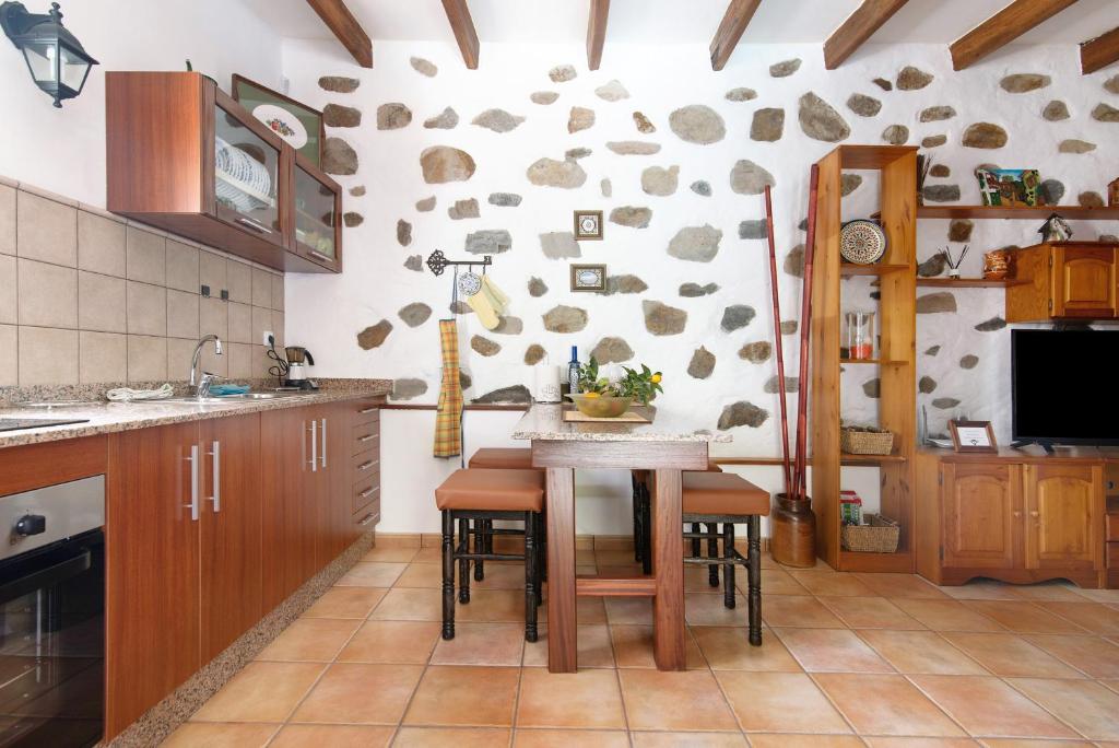 Kuchyň nebo kuchyňský kout v ubytování Casa Abuela Fela