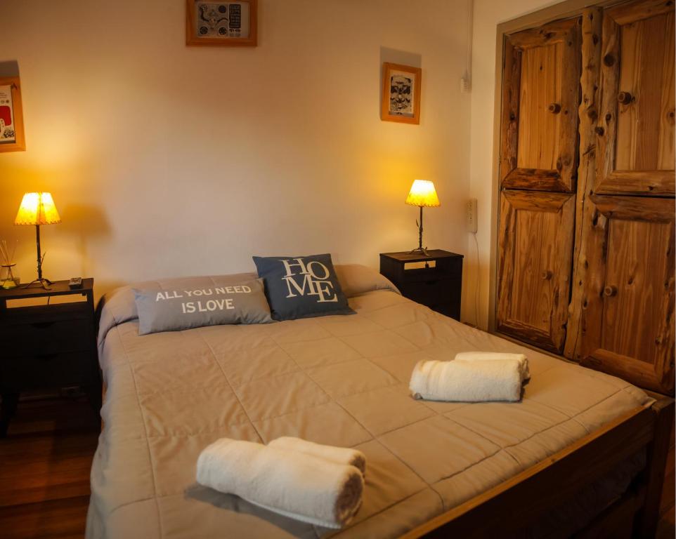 Postel nebo postele na pokoji v ubytování HOPA-Home Patagonia Hostel & Bar