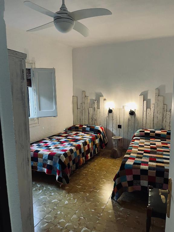 Posteľ alebo postele v izbe v ubytovaní Casa iaia
