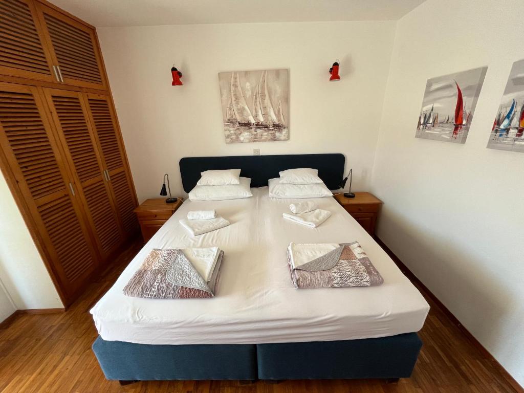 Postel nebo postele na pokoji v ubytování Apartments Šuda