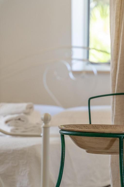 A bed or beds in a room at Trulli Francesca Ciclovia