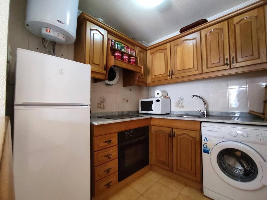 Kuchyňa alebo kuchynka v ubytovaní Apartamento cómodo a 300 metros de la playa