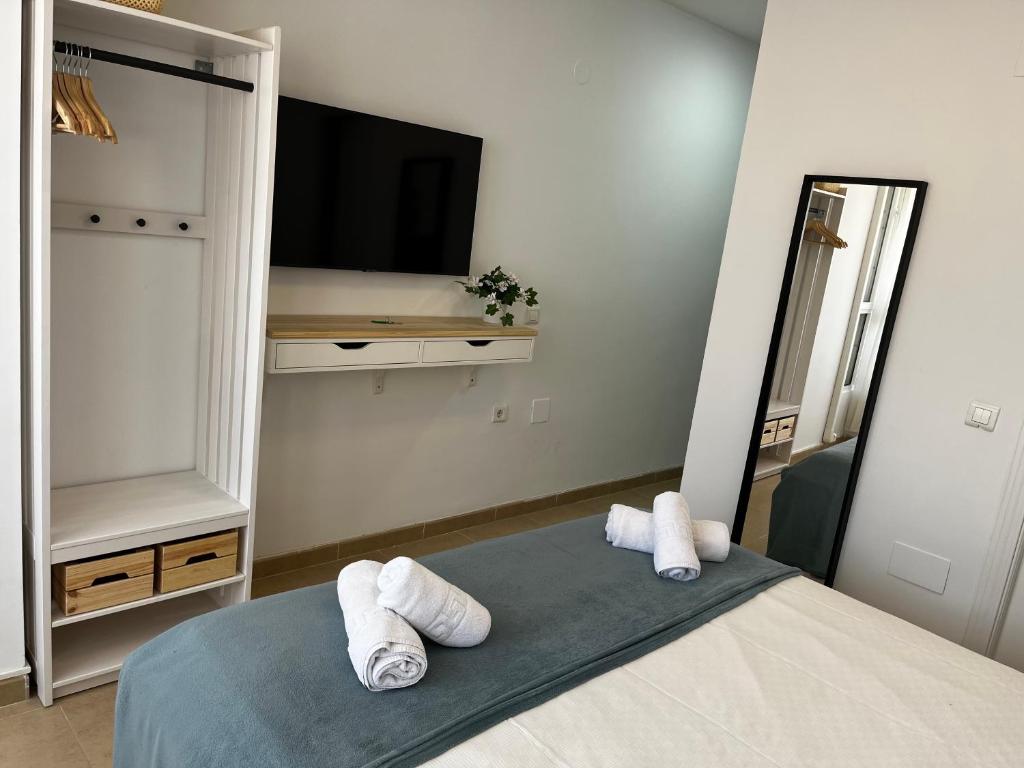 Posteľ alebo postele v izbe v ubytovaní Small Apartament By The Sea