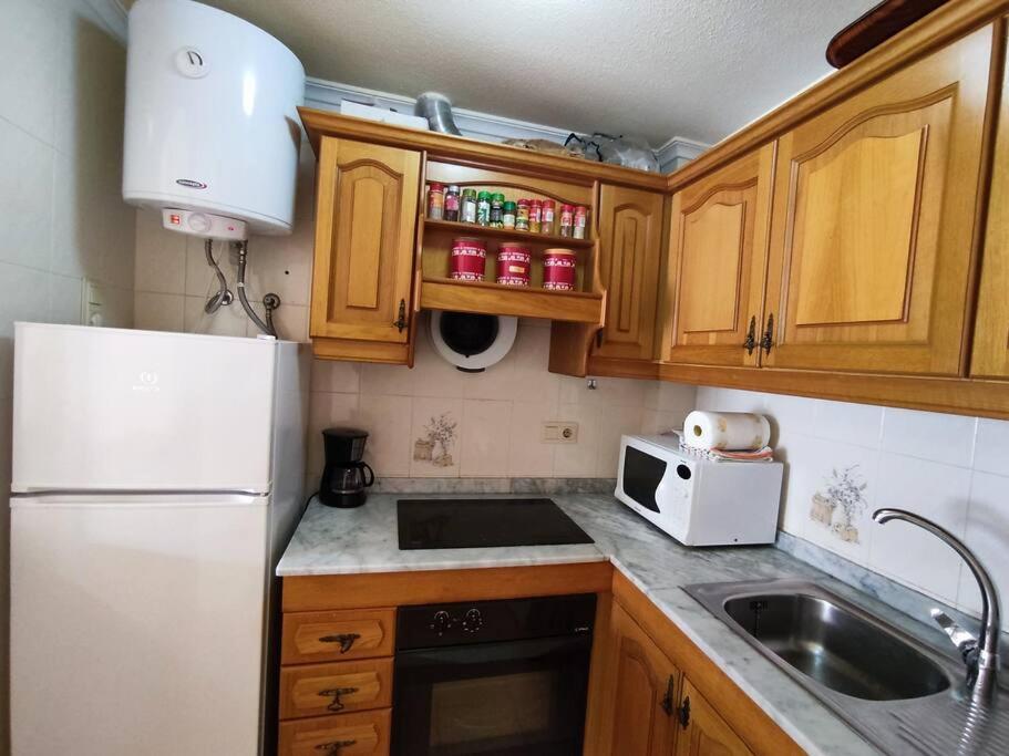 Kuchyňa alebo kuchynka v ubytovaní Apartamento cómodo a 300 metros de la playa