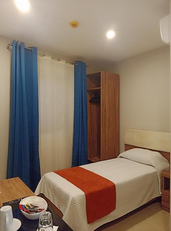 Postel nebo postele na pokoji v ubytování Duncan Guesthouse