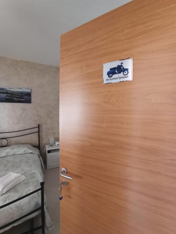 Postel nebo postele na pokoji v ubytování B&B In Sella