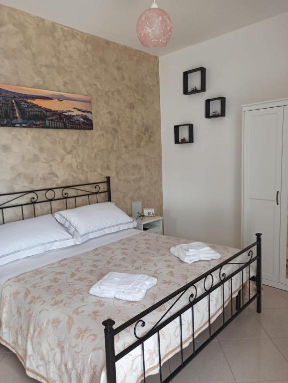 Postel nebo postele na pokoji v ubytování B&B In Sella