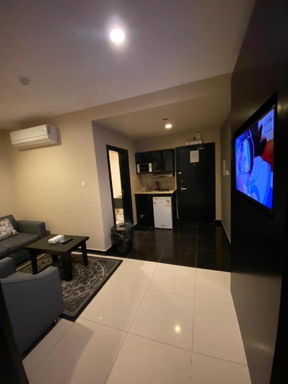 TV a/nebo společenská místnost v ubytování Al Taif Suites - Al Faisaliah