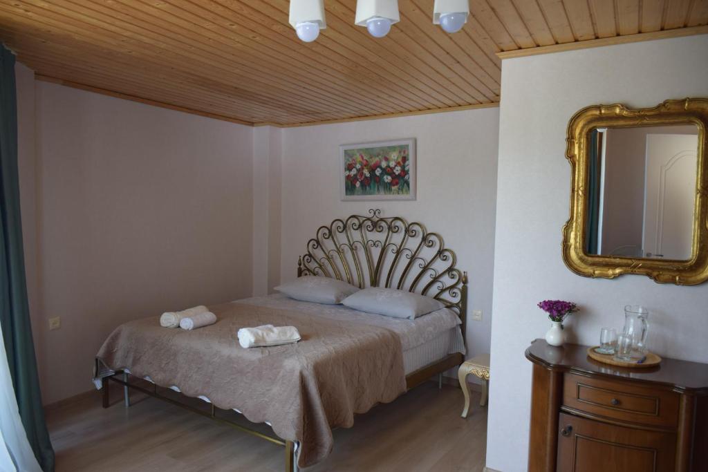 Llit o llits en una habitació de Guest House Ilto