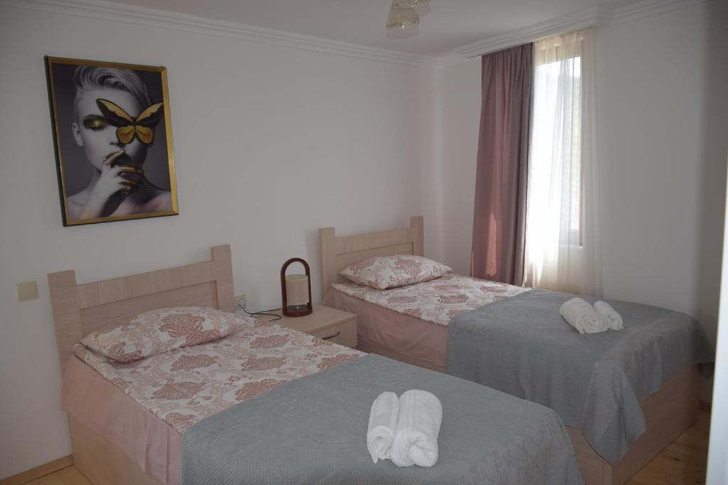 Llit o llits en una habitació de Guest House Ilto