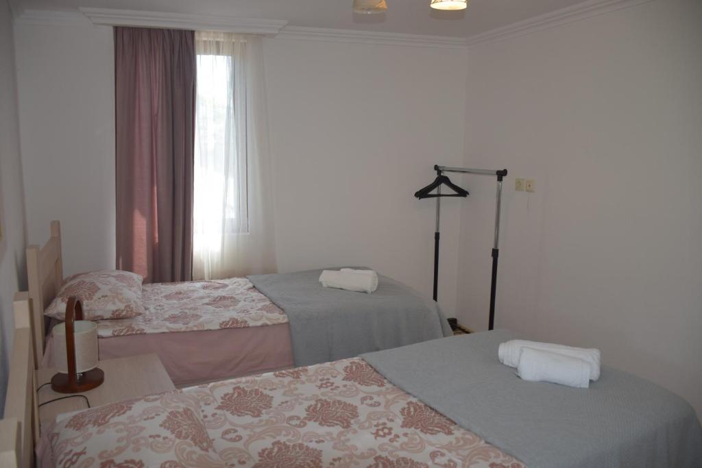 Llit o llits en una habitació de Guest House Ilto