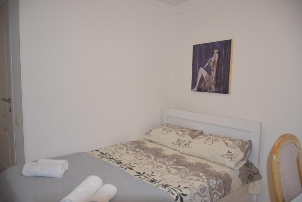 Llit o llits en una habitació de Guest House Ilto