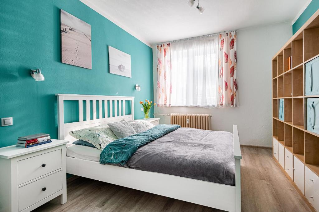 Voodi või voodid majutusasutuse Apartmán Jabloňová toas