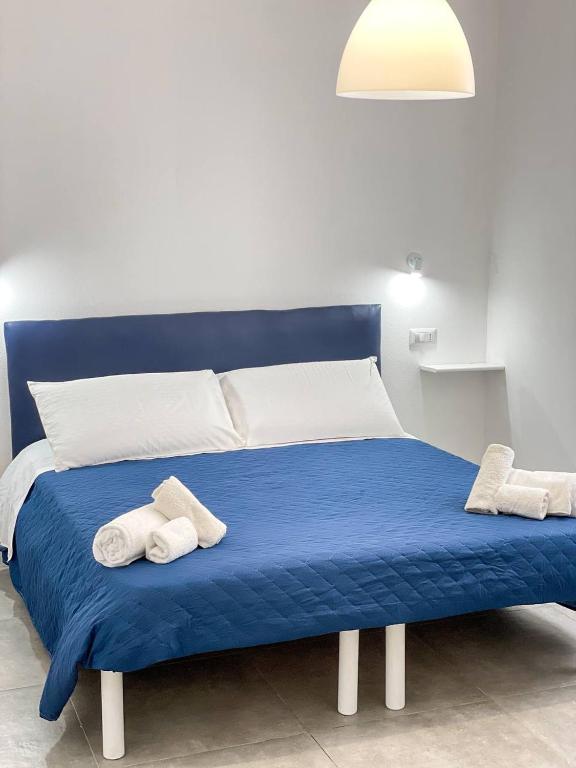 Postel nebo postele na pokoji v ubytování Tea House Alghero