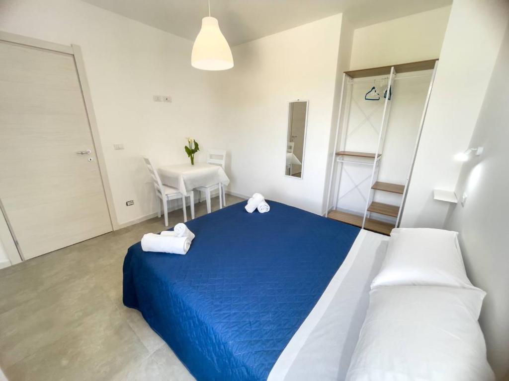 Postel nebo postele na pokoji v ubytování Tea House Alghero