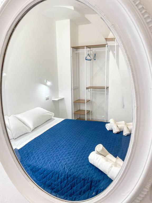 Postel nebo postele na pokoji v ubytování Tea House Alghero