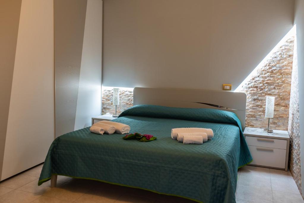 Postel nebo postele na pokoji v ubytování B&B al Vico Pepe