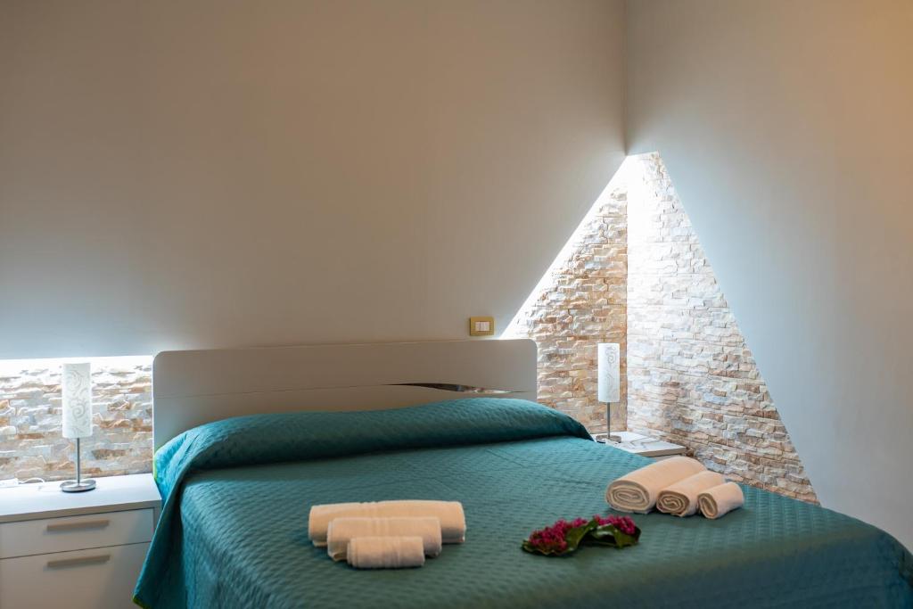 Postel nebo postele na pokoji v ubytování B&B al Vico Pepe