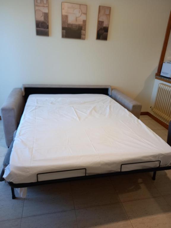 Posteľ alebo postele v izbe v ubytovaní Apartamento primera línea playa d samil