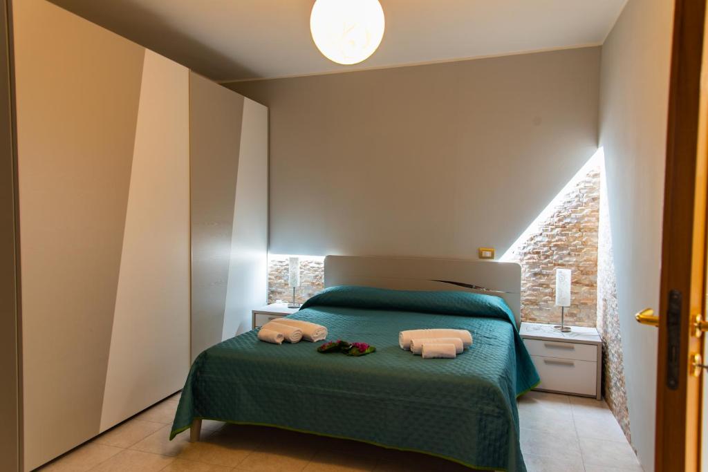 Postel nebo postele na pokoji v ubytování B&B al Vico Pepe
