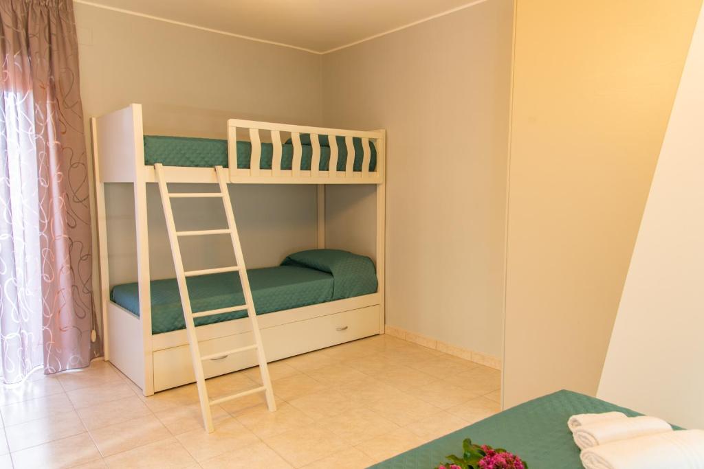 Postel nebo postele na pokoji v ubytování B&B al Vico Pepe