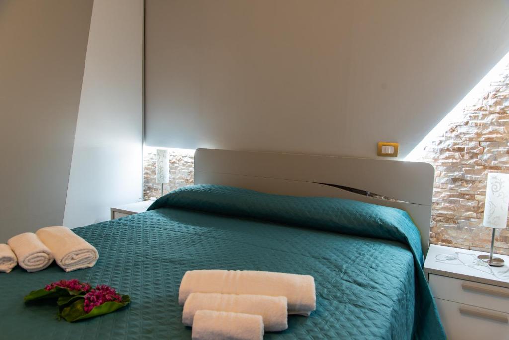 Postel nebo postele na pokoji v ubytování B&B al Vico Pepe