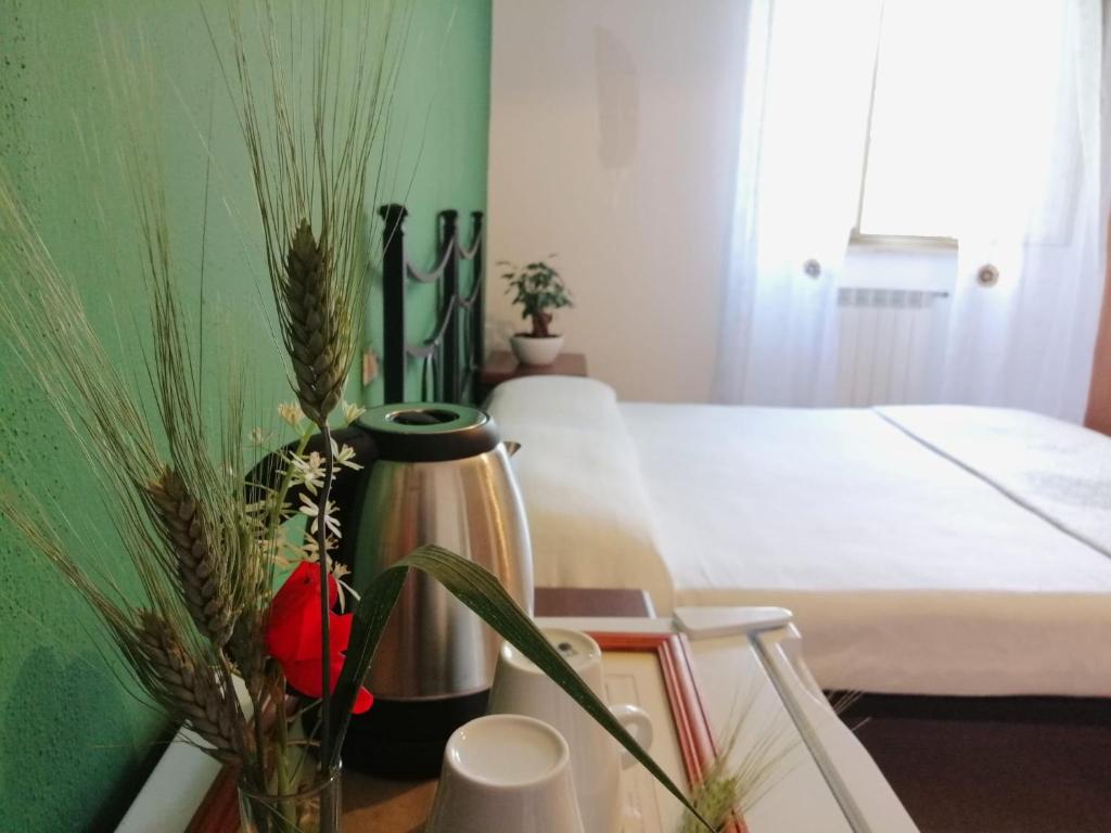 Postel nebo postele na pokoji v ubytování Agriturismo Podere Verdicchio