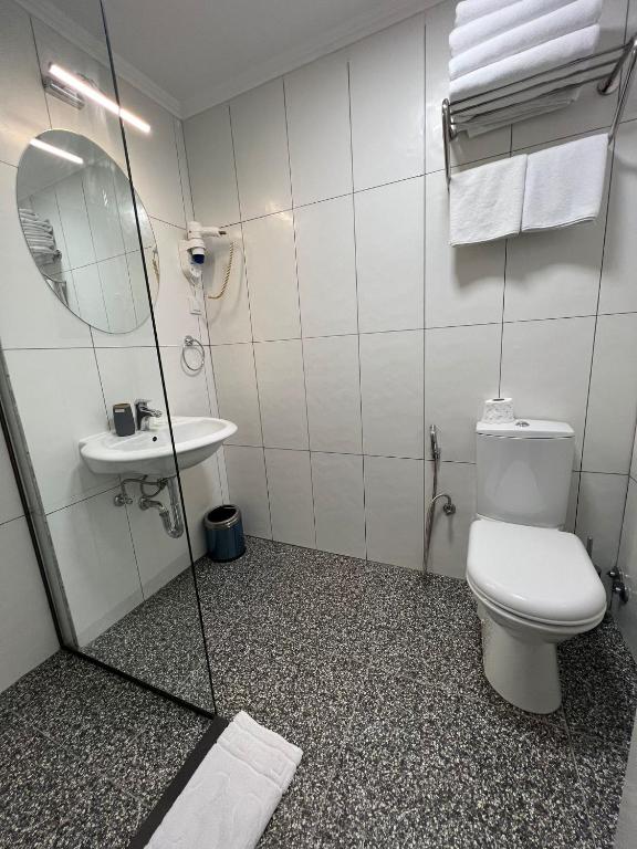 Koupelna v ubytování Amber Hotel
