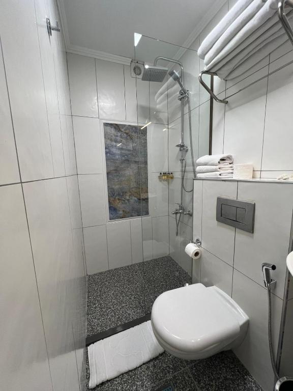 Koupelna v ubytování Amber Hotel