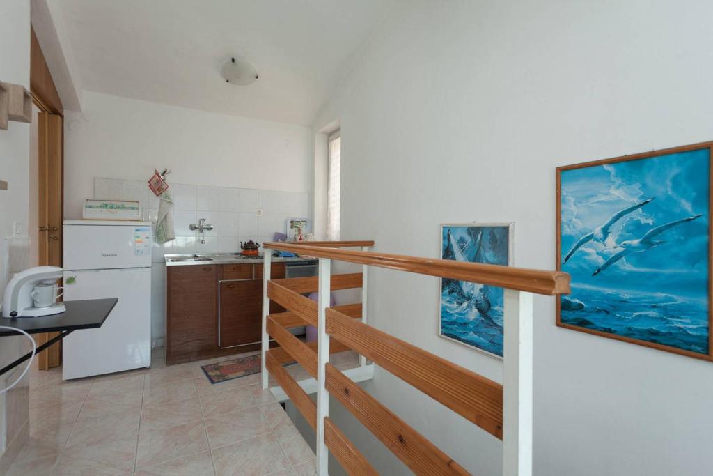 Kuchyň nebo kuchyňský kout v ubytování Cosy studio-apartment near the sea