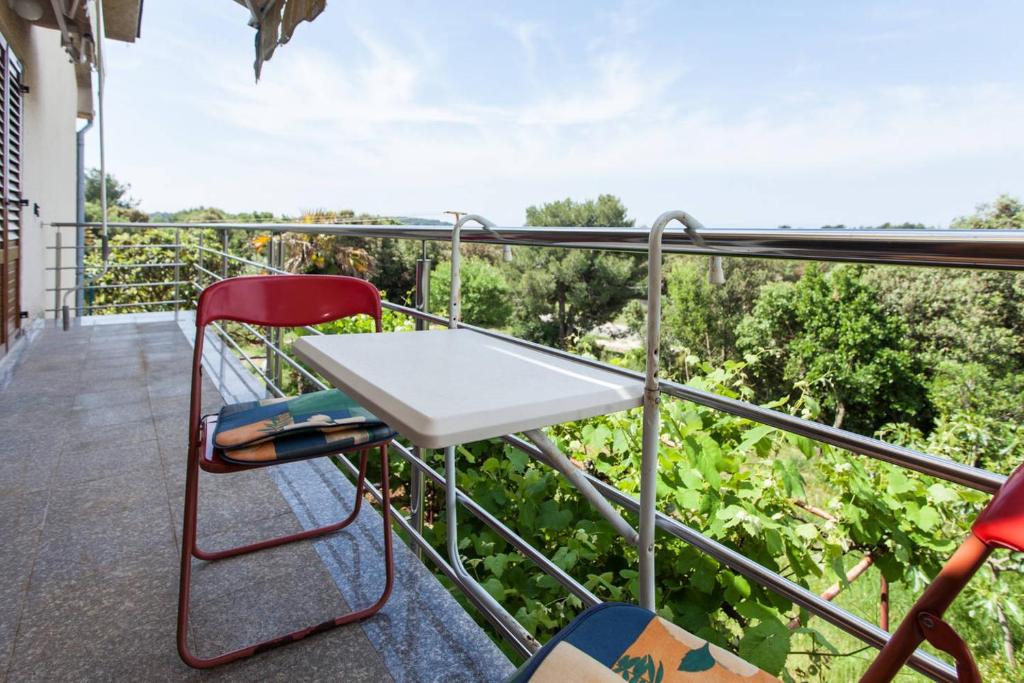 Balkón nebo terasa v ubytování Cosy studio-apartment near the sea