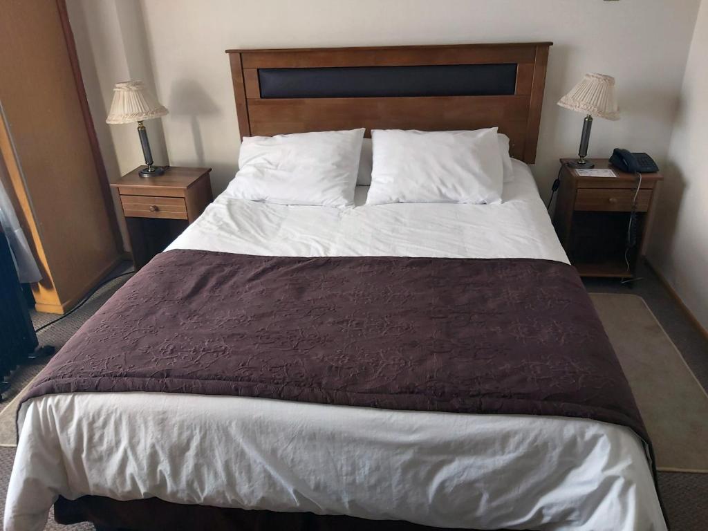 Postel nebo postele na pokoji v ubytování Hotel Esmeralda