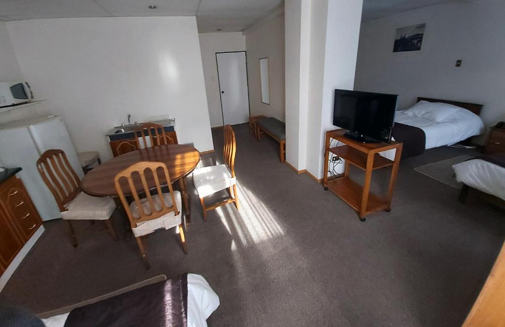 TV a/nebo společenská místnost v ubytování Hotel Esmeralda