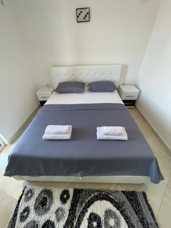 Postel nebo postele na pokoji v ubytování Queen Kodre Apartments