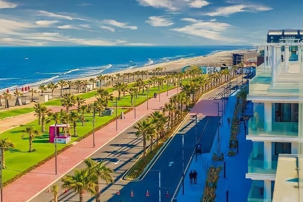 a view of the beach from a building at Portosaid بورتو سعيد (غرفه وصاله ) in `Ezbet Shalabi el-Rûdi