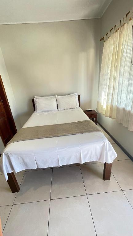 Postel nebo postele na pokoji v ubytování Pousada Brisa do Leste