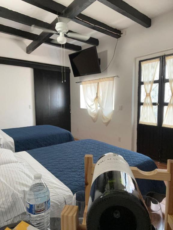 Postel nebo postele na pokoji v ubytování Hostal Luna 49