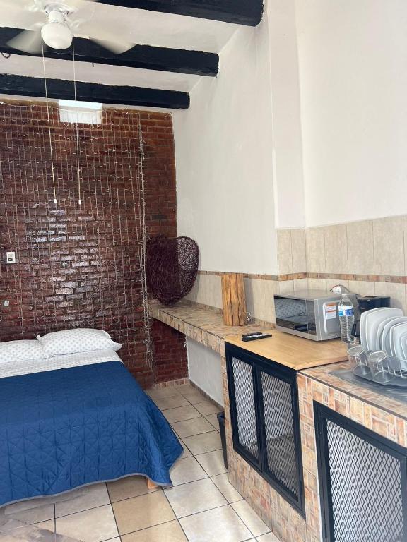 Kuchyň nebo kuchyňský kout v ubytování Hostal Luna 49