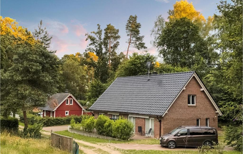 a car parked in front of a house at Awesome Home In Wittstock With Kitchen in Wittstock